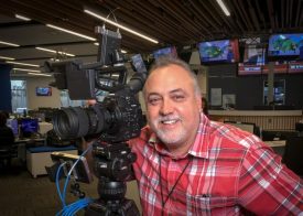 Erik With C300 in Newsroom